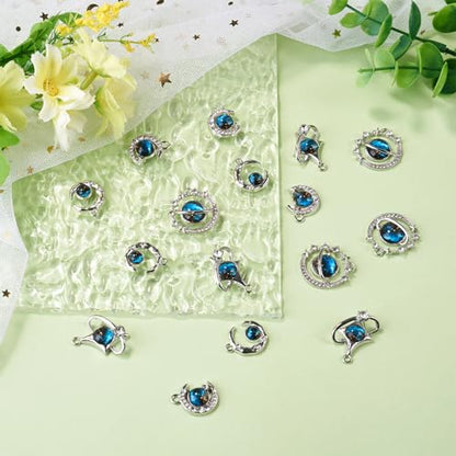 Blue Alloy Rhinestone Charms Cute Moon Star Planet Glass Charm | 16pcs 4 Styles Celestial Rhinestone Pendants Romantic Alloy Metal Charm with Glass for DIY Necklace Bracelet Jewelry Making - color: Dodger Blue