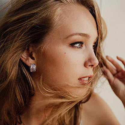 Mytys Two Tone Huggie Hoop Earrings Cross Over Design Twisted Rope Silver Gold Statement Wide Band Clip On Hoops for Women Fashion Jewelry Gift - color: Rose Gold & Silver