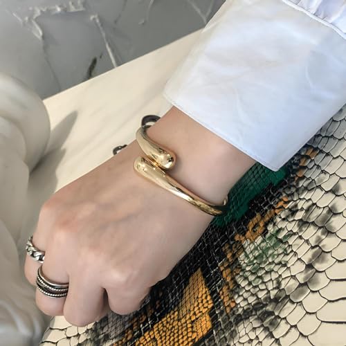 Golden Polished Chunky Twisted Hinged Waterdrop Bangle Bracelet for Women Spiraled Oval Bangle Bracelet - color: Gold Small Waterdrop Bangle