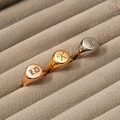 Anavia Personalized Initial Signet Ring, Customized Letter Laser Engraved Stainless Steel Gold Glossy Finish Round Signet Band Ring, Wedding Engagement Promise Ring for Women Men - color: Gold, size: US 5