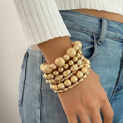 KISS WIFE Gold Beaded Bracelets for Women, Stackable Stretch Bracelet Set | 13 stretch bracelets combine polished gold-tone beads and faux pearls for stacked or individual everyday styling. - color: Gold Matte