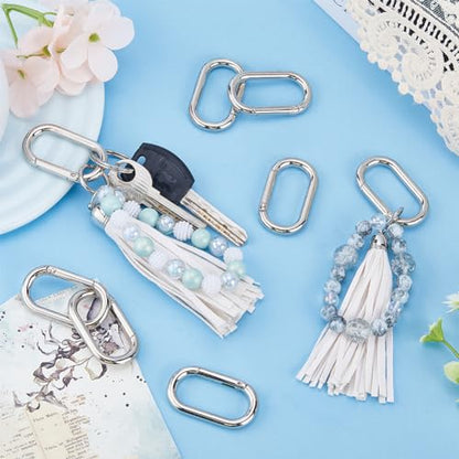 SUNNYCLUE 1 Box 24Pcs Trigger Spring O Rings O Ring Clips 44x25mm Rounded Rectangle Purse Ring Clip Clasps Spring Key Ring Carabiner Clips Keyring Snap Hooks Buckles for Jewelry Clasps DIY Crafts - color: 1 Box 24pcs Spring Buckles 44x25mm