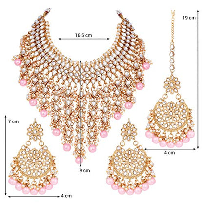Aheli Elegant Indian Wedding Wear Faux Kundan Studded Choker Necklace with Maang Tikka Set Ethnic Fashion Jewelry for Women Maroon Kundan & Pearl Drop - color: Pink
