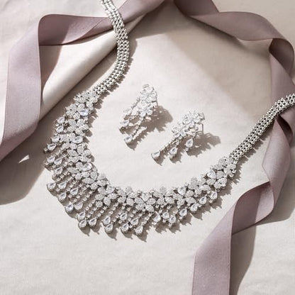EVER FAITH Bridal Jewelry for Bride Bridesmaid, Elegant Cubic Zirconia Birthstone Cluster Flower Teardrop Wedding Party Necklace Dangle Earrings Sets for Women - color: White