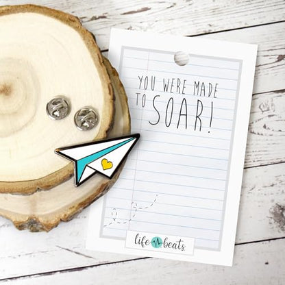 Inspirational Enamel Pin by LifeBeats | Cute Pin for Clothes, Jackets, Hats, Bags, and Lanyards | Hat Pin Comes with a Greeting Card | Lapel Pin with Sturdy Backing - style: You Were Made to Soar Paper Airplane