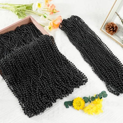 SHAOQINLIN 30 PCS Black Bead Necklaces, Black Mardi Gras Party Beads, New Year Eve Necklaces, 33 Inch Round Halloween Beaded Necklace for Mardi Gras, Christmas, Halloween, New Year Party Favors - color: Black