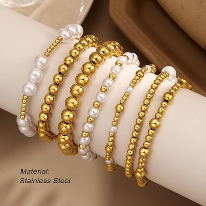 KISS WIFE Gold Beaded Bracelets for Women, Stackable Stretch Bracelet Set | 13 stretch bracelets combine polished gold-tone beads and faux pearls for stacked or individual everyday styling. - color: Gold Stainless Steel
