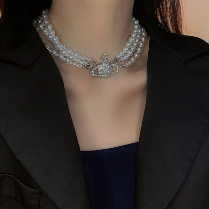Dreuyet Saturn Pearl Necklace and Earrings Set Crystal Planet Earrings Dainty Artificial Pearl Choker Necklace Charm Gifts for Mum Wife Wedding Birthday Anniversary - color: 3 Layered Pearl Silver