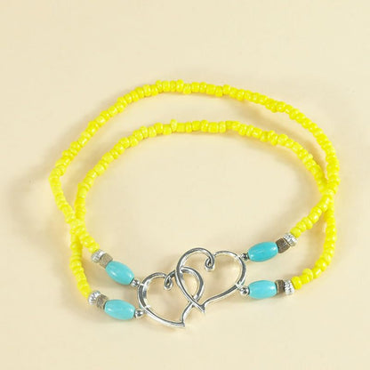 Elastic Beaded Ankle Bracelets for Women Double Heart Layered Stretch Ankle Bracelets Waterproof Dainty Boho Beaded Anklets for Summer Beach Foot Jewelry - color: Yellow Silver