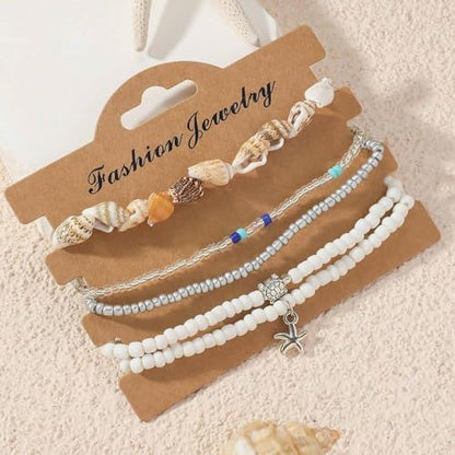 Qceasiy Starfish Ankle Bracelets for Women, Boho Beaded Beach Anklets Set | Gold-plated layered anklets in seashell, disc, and conch styles, with stretch or adjustable fits for summer beach outfits. - color: White 1