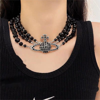 Dreuyet Saturn Pearl Necklace and Earrings Set Crystal Planet Earrings Dainty Artificial Pearl Choker Necklace Charm Gifts for Mum Wife Wedding Birthday Anniversary - color: 3 Layered Pearl Silver Black