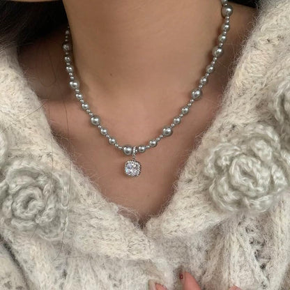 18K Gold Plated Pink Faux Pearl Strand Necklace for Women, Sparkling Cushion-Cut Cubic Zirconia Halo Pendant, Elegant Statement Jewelry with Shimmering Graduated Beads for Formal Wear