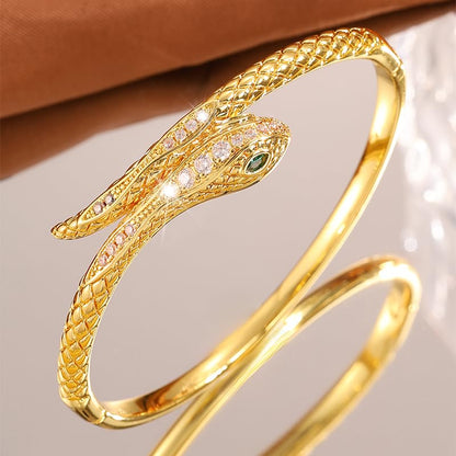 Gold Snake Bangle Bracelet for Women, Cubic Zirconia Copper Cuff Jewelry | Gold-plated copper snake cuff with cubic zirconia, green stone accent and comfortable open cuff design.