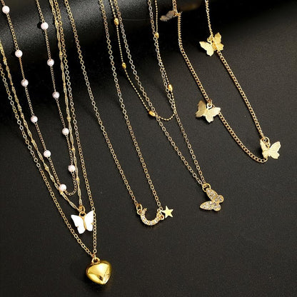 11 Pcs Gold Tone Layered Necklace Set, Dainty Pearl Chain, CZ Butterfly, Heart, Moon Star & Vertical Bar Pendant, Minimalist Trendy Jewelry for Women (Gold)
